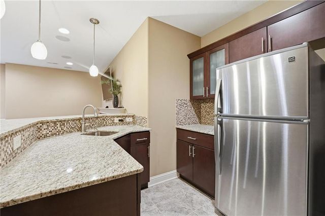 17707 S MILLRIDGE Street, Olathe, KS 66061