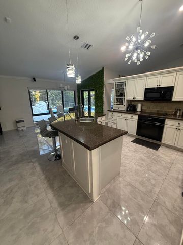 7670 Live Oak Drive, Coral Springs, FL 33065