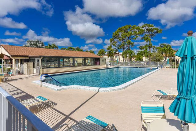 305 Knotty Pine Circle, Greenacres, FL 33463