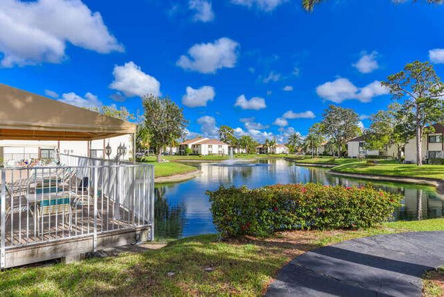 305 Knotty Pine Circle, Greenacres, FL 33463