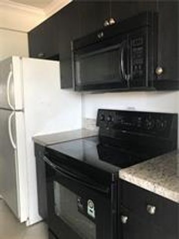 1150 E Sample Road 306, Pompano Beach, FL 33064