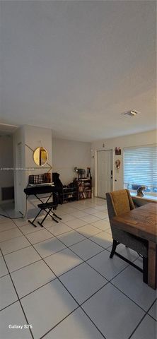 7715 SW 9th St, North Lauderdale, FL 33068