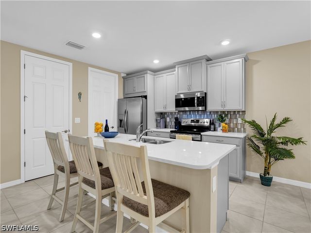 14695 Edgewater CIR, Naples, FL 34114