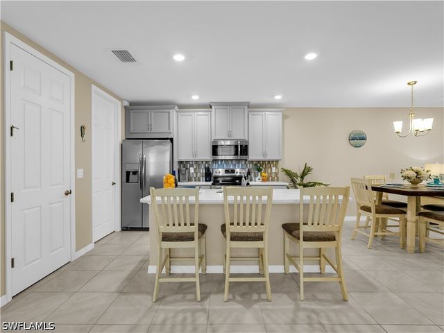 14695 Edgewater CIR, Naples, FL 34114