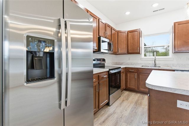 6015 Red Berry Juniper Drive, Charlestown, IN 47111