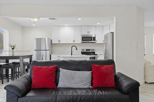 9847 Fairway Cove Lane, Plantation, FL 33324