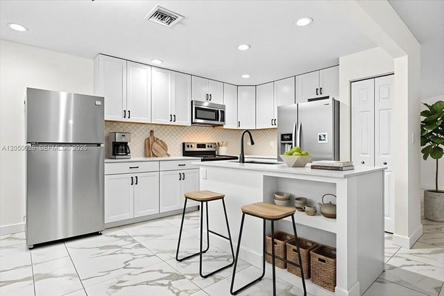 9847 Fairway Cove Lane, Plantation, FL 33324