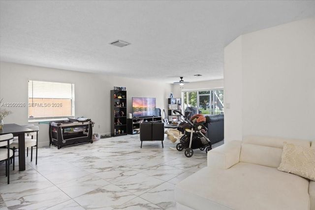 9847 Fairway Cove Lane, Plantation, FL 33324