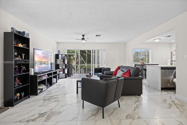 9847 Fairway Cove Lane, Plantation, FL 33324