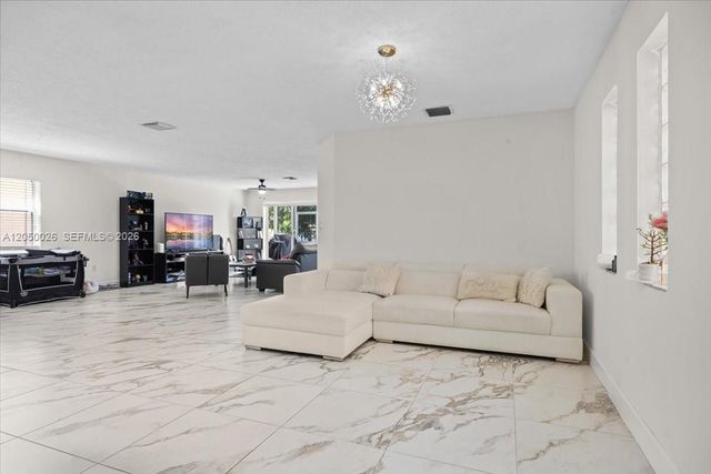 9847 Fairway Cove Lane, Plantation, FL 33324