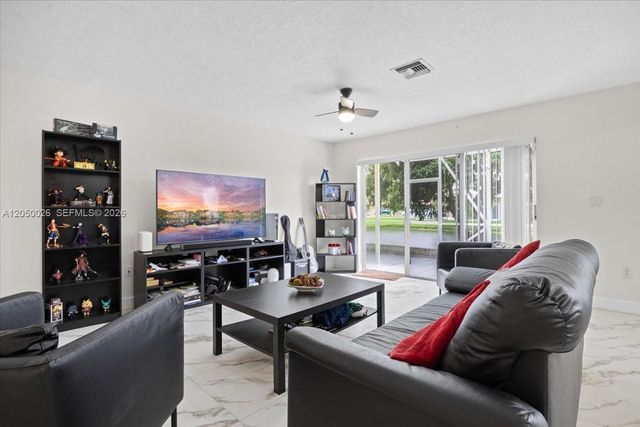 9847 Fairway Cove Lane, Plantation, FL 33324