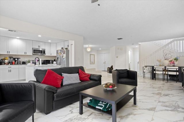 9847 Fairway Cove Lane, Plantation, FL 33324