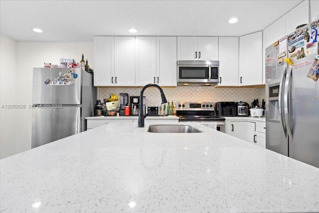 9847 Fairway Cove Lane, Plantation, FL 33324