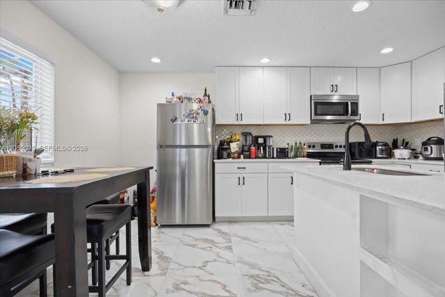 9847 Fairway Cove Lane, Plantation, FL 33324