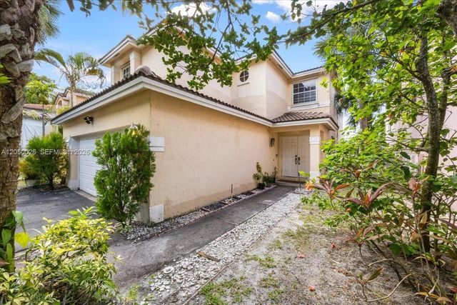 9847 Fairway Cove Lane, Plantation, FL 33324