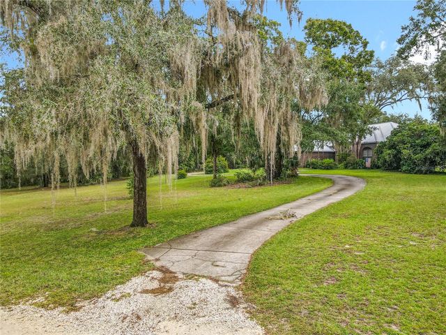 520 FOREST CREEK RUN, De Leon Springs, FL 32130