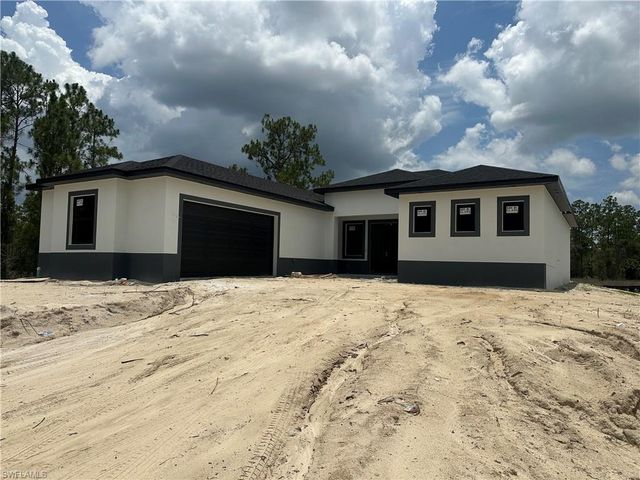 119 Moore AVE, Lehigh Acres, FL 33936