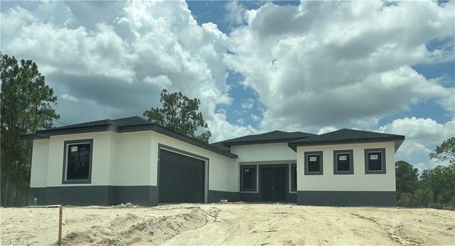 119 Moore AVE, Lehigh Acres, FL 33936
