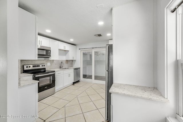 1228 Azalea Court E, Melbourne, FL 32935