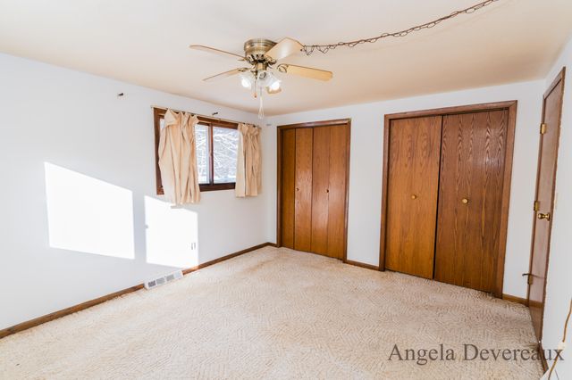 6040 N Hillman Road, Six Lakes, MI 48886