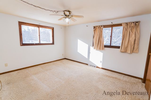 6040 N Hillman Road, Six Lakes, MI 48886