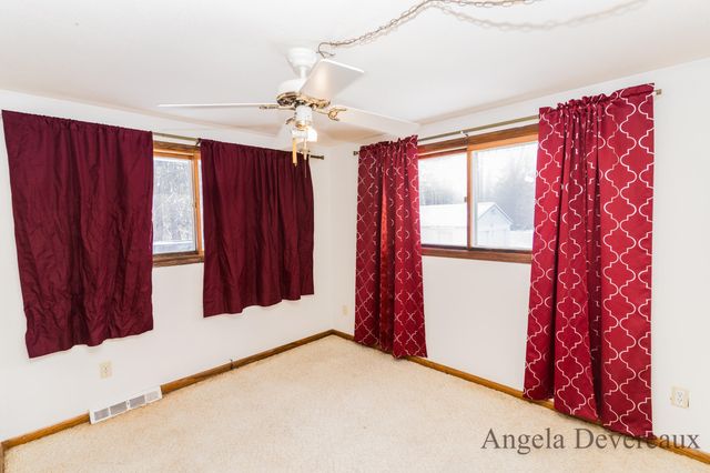 6040 N Hillman Road, Six Lakes, MI 48886