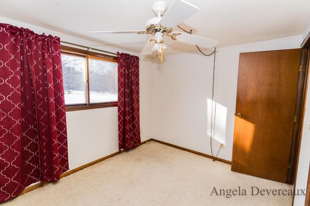 6040 N Hillman Road, Six Lakes, MI 48886