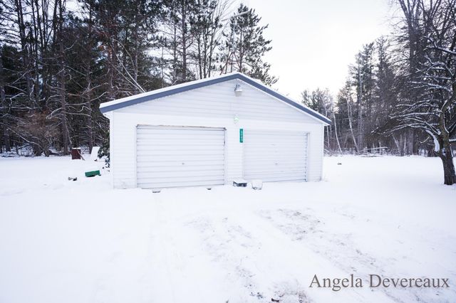 6040 N Hillman Road, Six Lakes, MI 48886