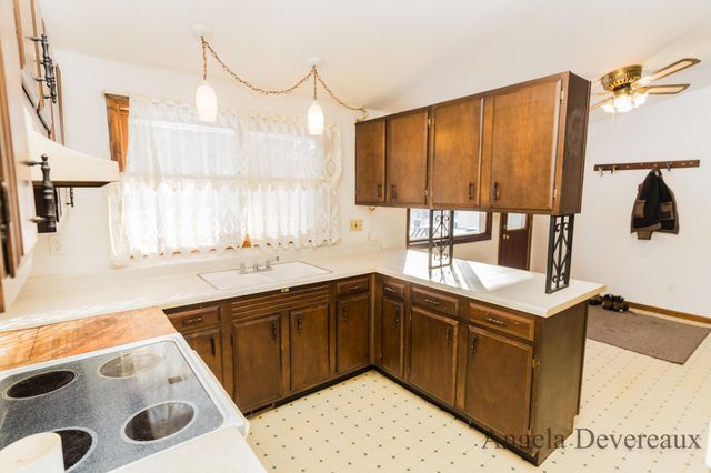 6040 N Hillman Road, Six Lakes, MI 48886