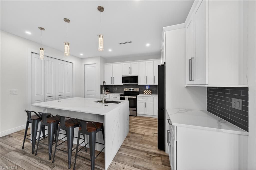 Image 10 of property listing at 1902 NE 20th ST, Cape Coral, FL 33909