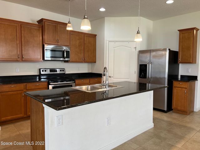 728 Remington Green Drive SE, Palm Bay, FL 32909