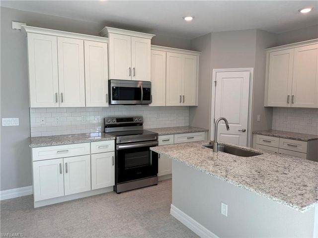 1026 Grant BLVD, Lehigh Acres, FL 33974