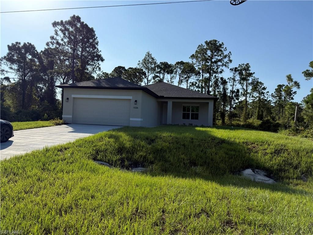 1026 Grant BLVD, Lehigh Acres, FL 33974