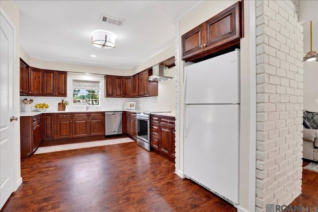 10413 Stringer Bridge Rd, St Amant, LA 70774