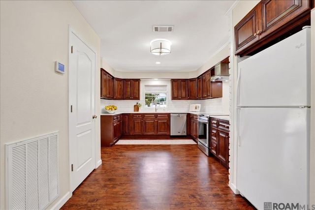 10413 Stringer Bridge Rd, St Amant, LA 70774