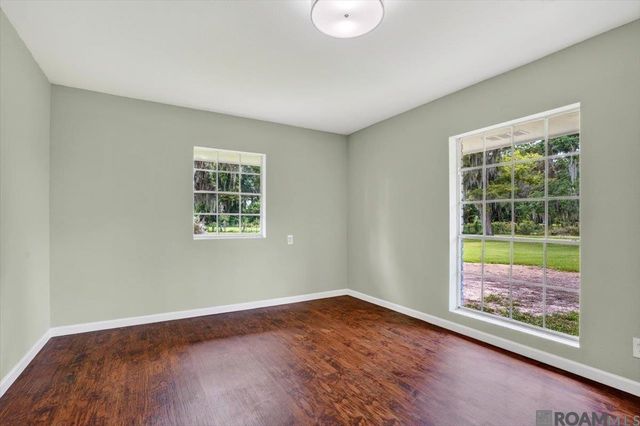 10413 Stringer Bridge Rd, St Amant, LA 70774