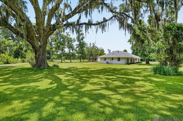 10413 Stringer Bridge Rd, St Amant, LA 70774