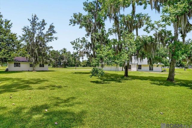 10413 Stringer Bridge Rd, St Amant, LA 70774