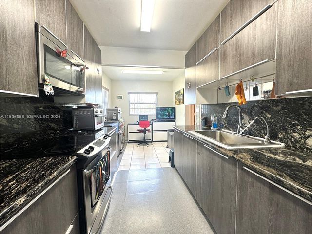 12900 SW 13th Street 214E, Pembroke Pines, FL 33027