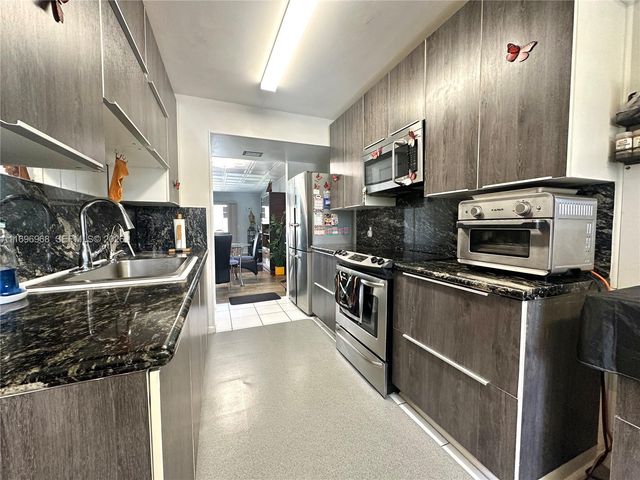 12900 SW 13th Street 214E, Pembroke Pines, FL 33027