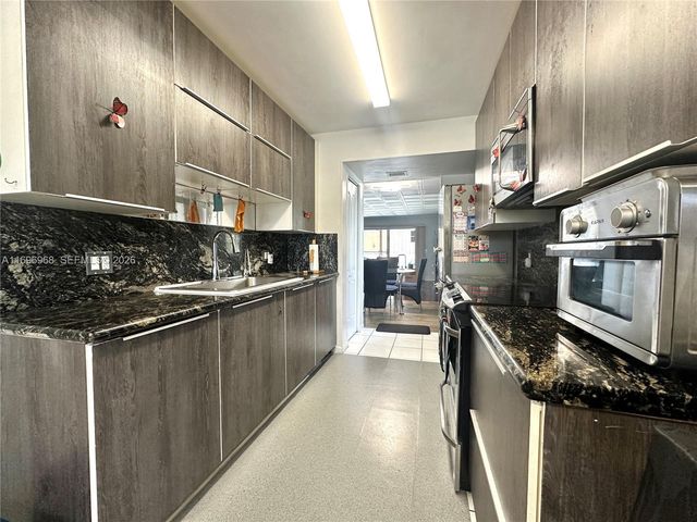 12900 SW 13th Street 214E, Pembroke Pines, FL 33027