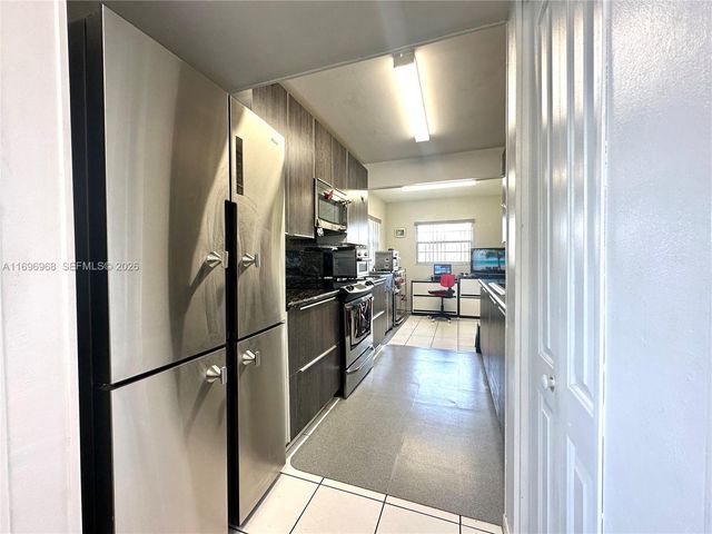 12900 SW 13th Street 214E, Pembroke Pines, FL 33027