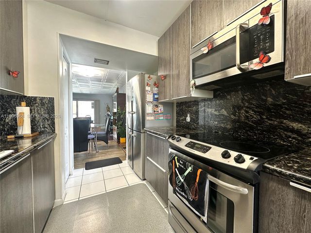 12900 SW 13th Street 214E, Pembroke Pines, FL 33027