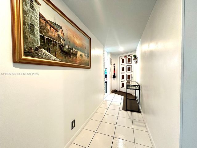 12900 SW 13th Street 214E, Pembroke Pines, FL 33027