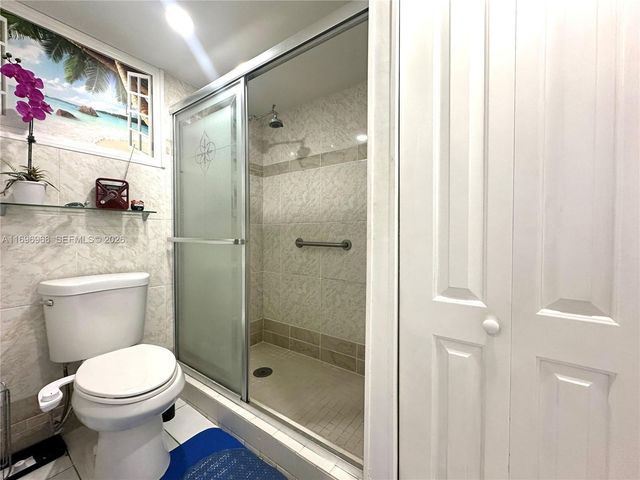 12900 SW 13th Street 214E, Pembroke Pines, FL 33027