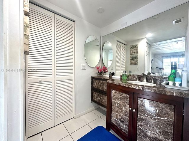 12900 SW 13th Street 214E, Pembroke Pines, FL 33027