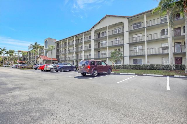 12900 SW 13th Street 214E, Pembroke Pines, FL 33027