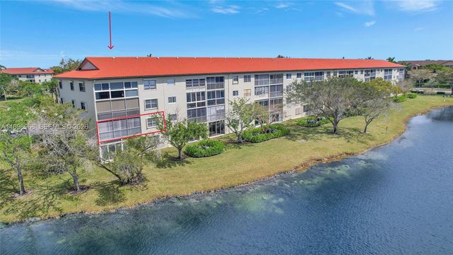 12900 SW 13th Street 214E, Pembroke Pines, FL 33027