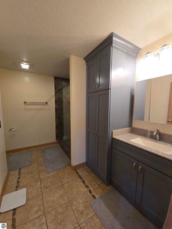 Image 24 of property listing at 10989 E Pleasant Valley Road, Shepherd, MI 48883