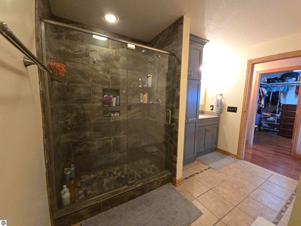 Image 25 of property listing at 10989 E Pleasant Valley Road, Shepherd, MI 48883